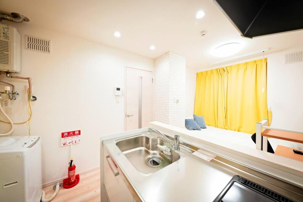 明るい室内で美室を提供　サービスアパ―トメントsapporo南8条 Apartment