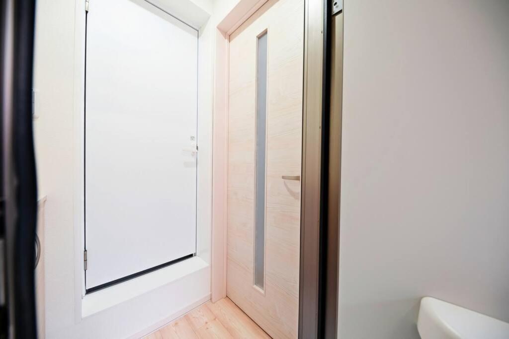明るい室内で美室を提供　サービスアパ―トメントsapporo南8条 Apartment *