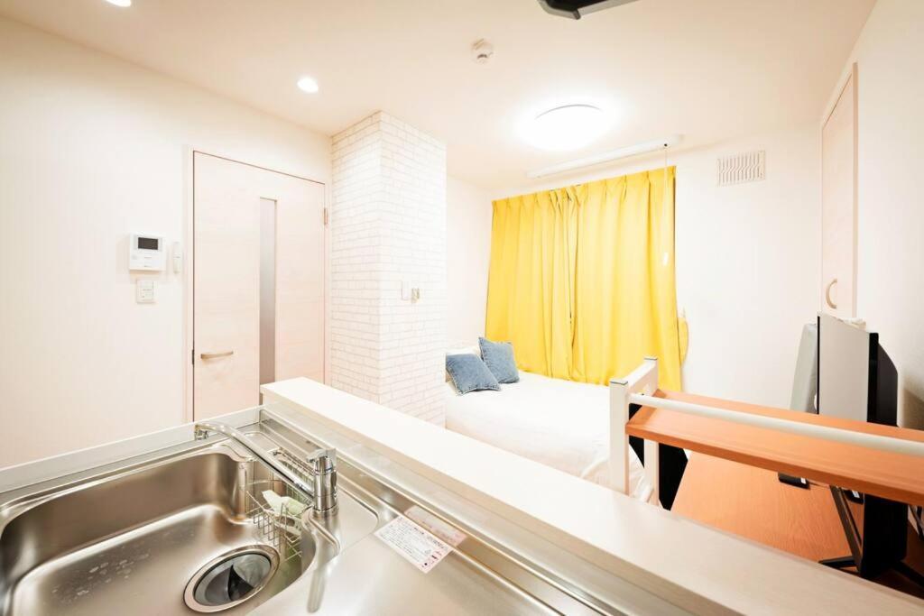 明るい室内で美室を提供　サービスアパ―トメントsapporo南8条 Apartment