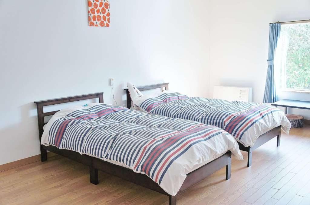 Holiday home Kaneyutei & Asahi Group 札幌金湯亭ホテル & *