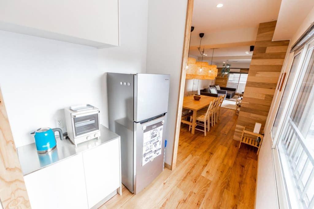 The East Avenue Apartment *