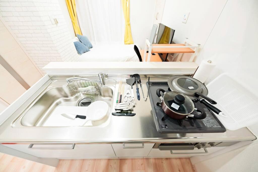 明るい室内で美室を提供　サービスアパ―トメントsapporo南8条 Apartment