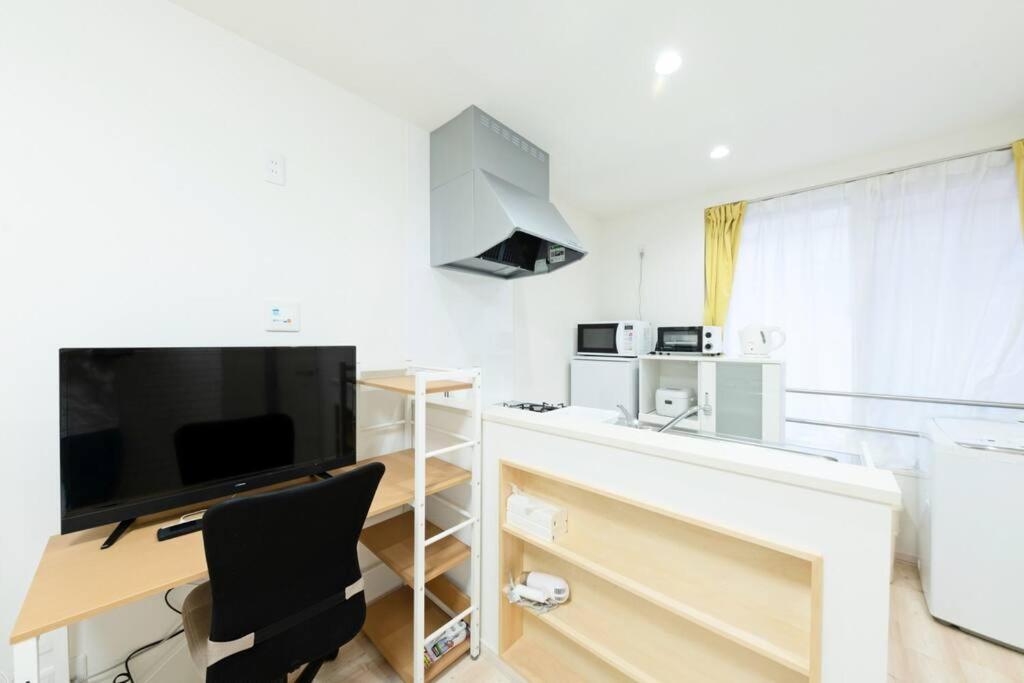 明るい室内で美室を提供　サービスアパ―トメントsapporo南8条 Apartment