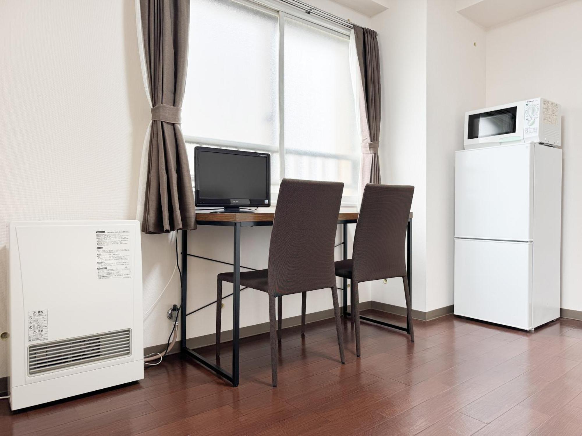 ローヤルハイツ菊水駅 Apartment