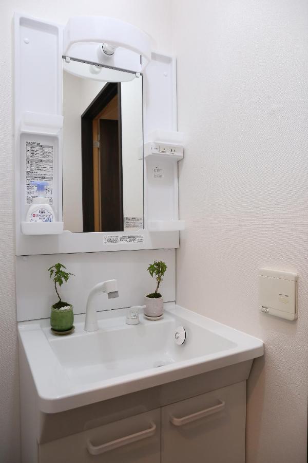 Holiday home 南2条蒼龍 希少な最大18名様ご宿泊可能の大豪邸 駅徒歩6分 無料駐車場4つ付き *