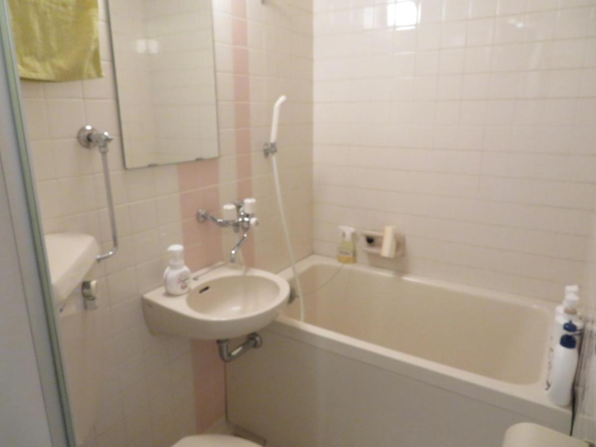 直前半額プライベート個室トイレバスタブ付民泊札幌市中心部でシンプルな滞在 Apartment
