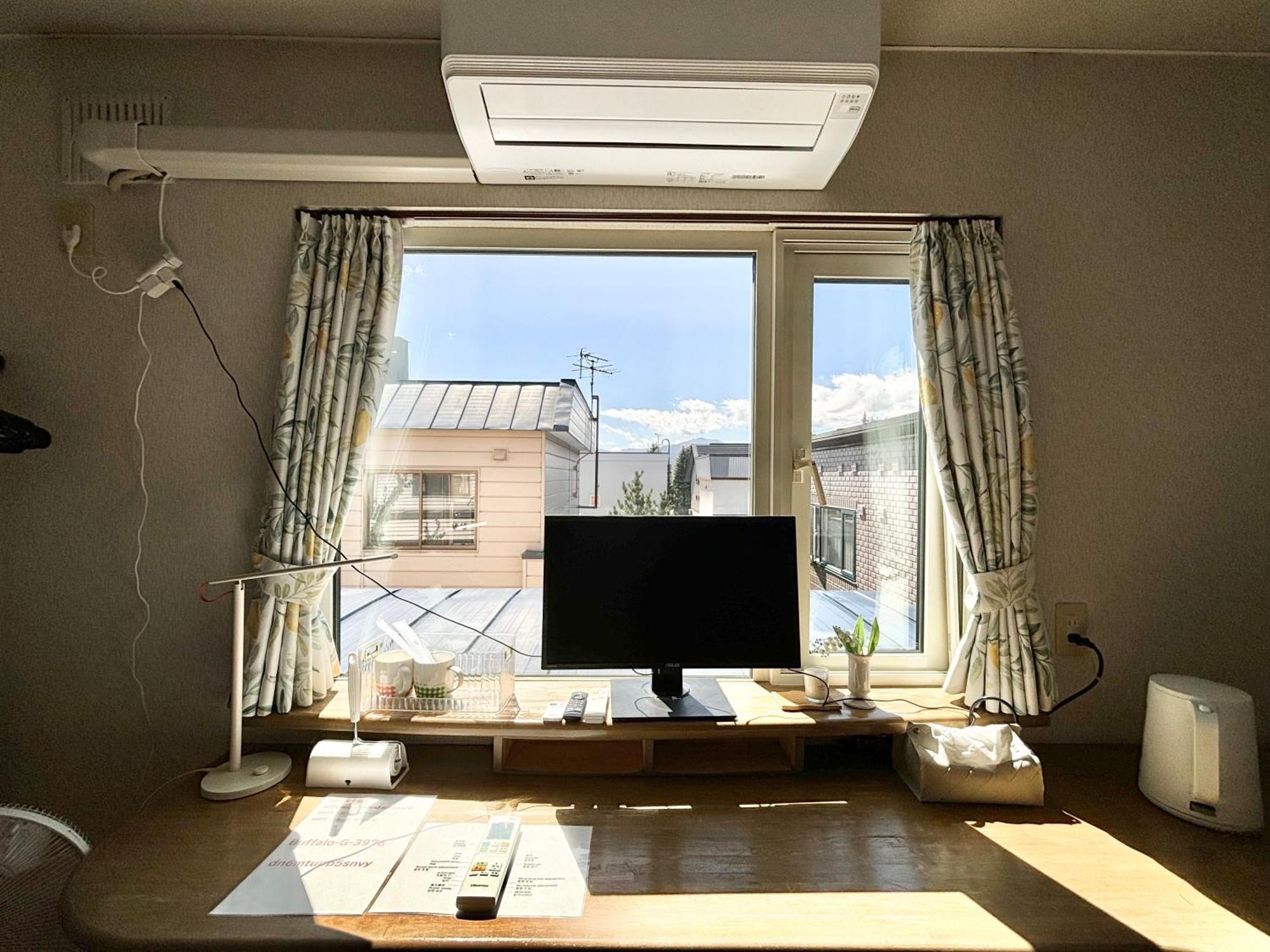 Homestay Sharedhouse Shinrinkei: Free Parking & Aso Station Shuttle *