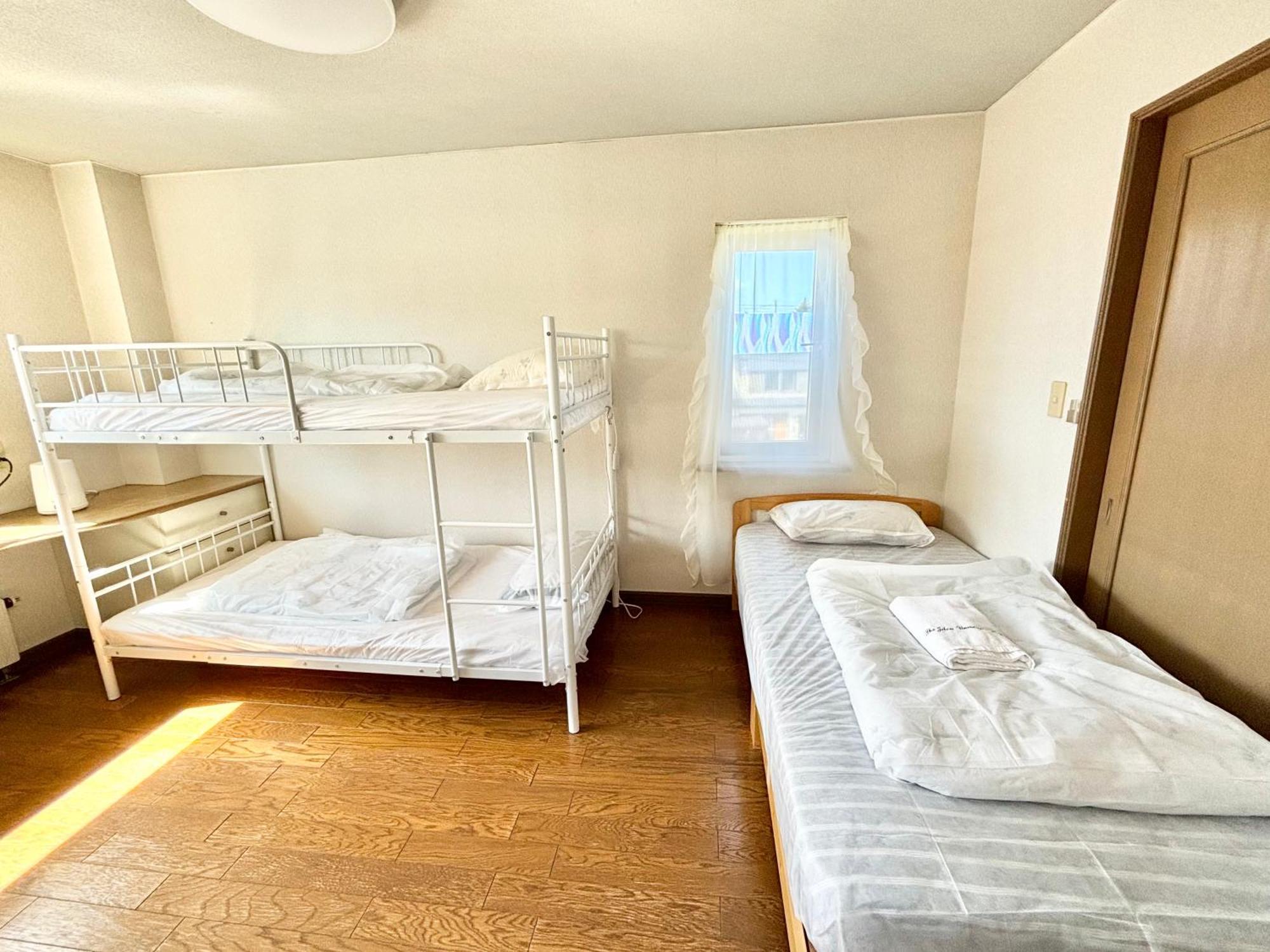 Homestay Sharedhouse Shinrinkei: Free Parking & Aso Station Shuttle